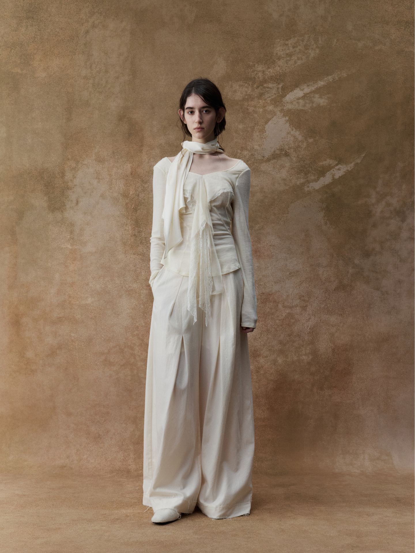 ELYWOOD WHITE DIAGONALLY PLEATED TROUSERS