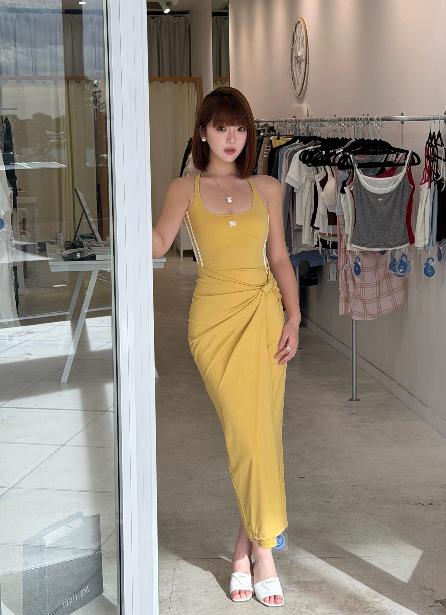 NAWS SKIN TWIST DRESS IN YELLOW