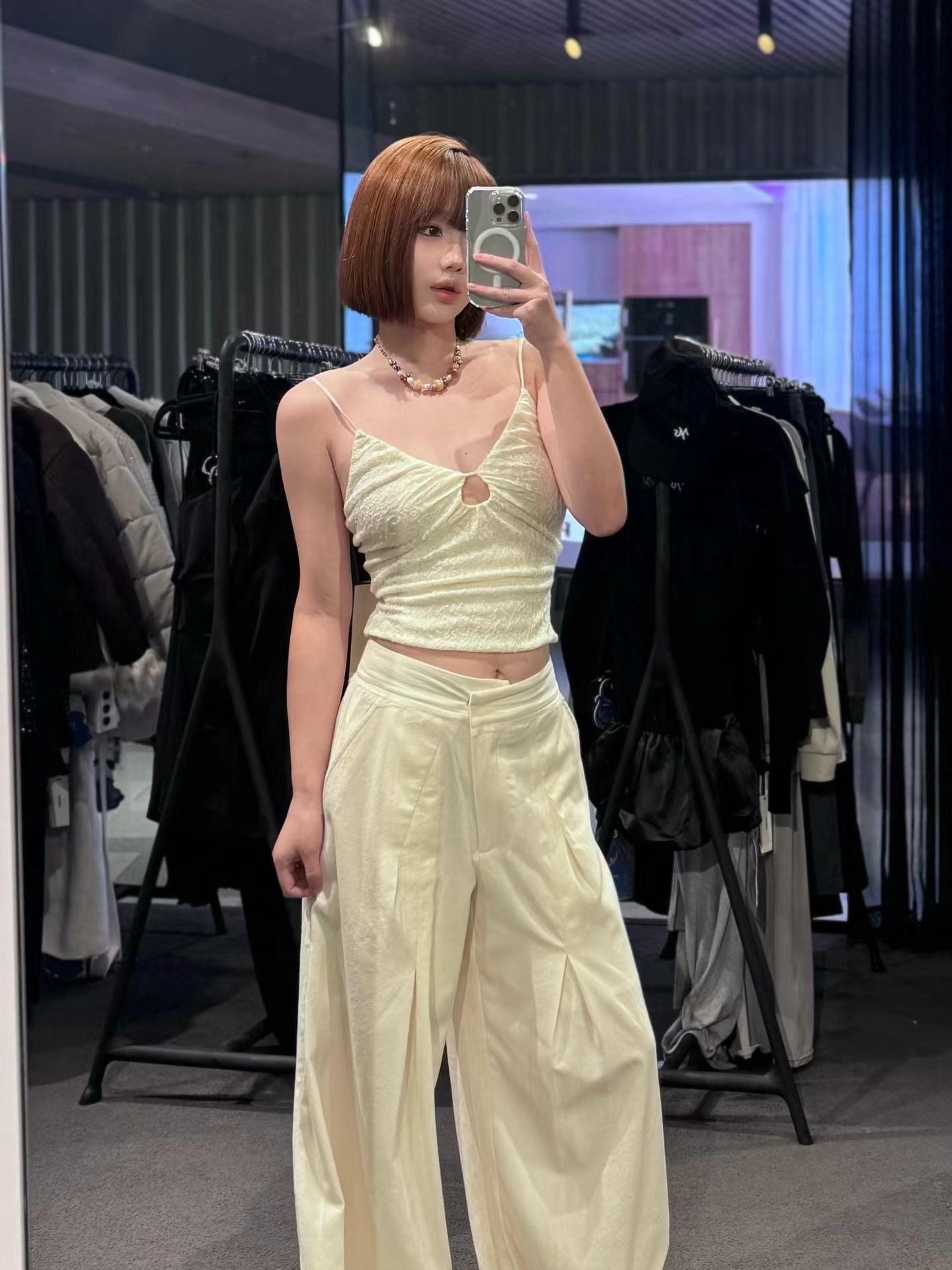 ELYWOOD WHITE DIAGONALLY PLEATED TROUSERS